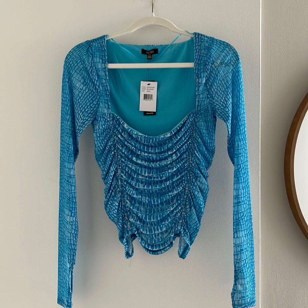 Revolve top